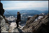 Woman climber rappels from Grand Teton. Grand Teton National Park ( color)