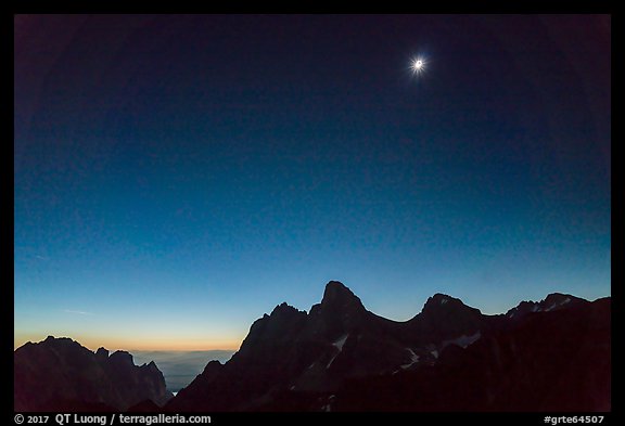 Solar eclipse above the Tetons, begining of totality. Grand Teton National Park, Wyoming, USA.