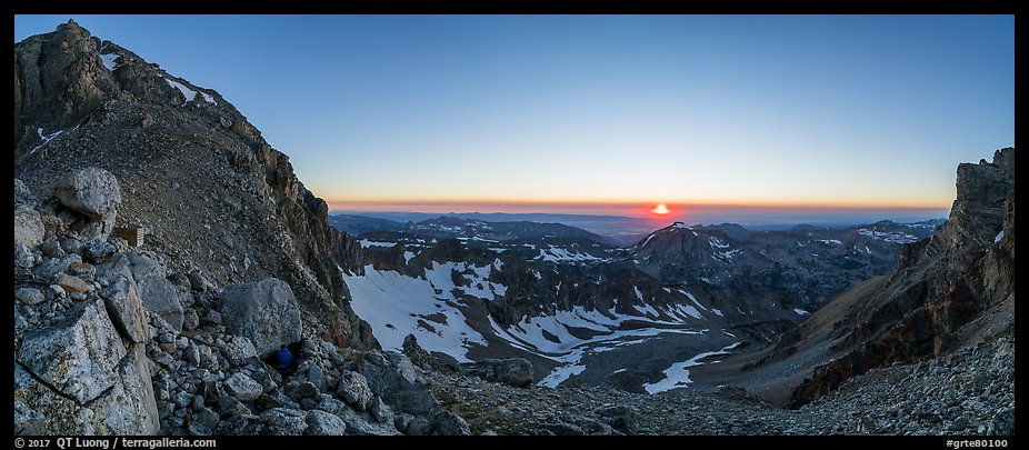 View from from Lower Saddle with Middle Teton and sun setting. Grand Teton National Park, Wyoming, USA.