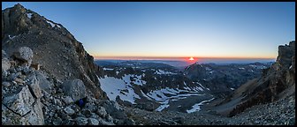 View from from Lower Saddle with Middle Teton and sun setting. Grand Teton National Park (Panoramic color)