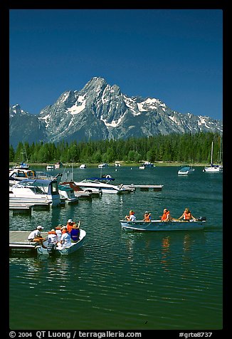 Boaters at Colter Bay marina with Mt Moran in the background, morning. Grand Teton National Park (color)
