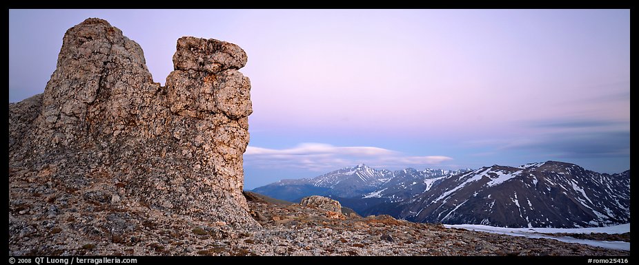Rock towers on high pass and mountains at dusk. Rocky Mountain National Park (color)