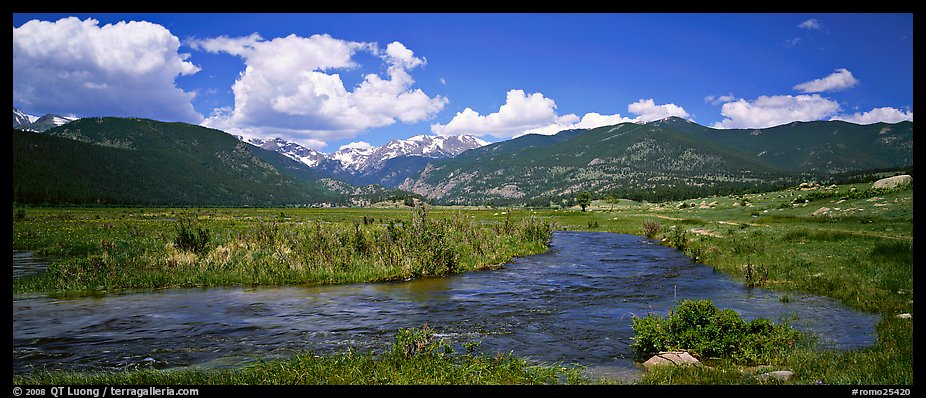 Mountain scenery with green meadows and stream. Rocky Mountain National Park, Colorado, USA.