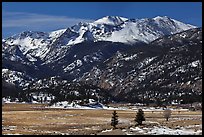 Thawing meadow and snowy peaks, late winter. Rocky Mountain National Park ( color)