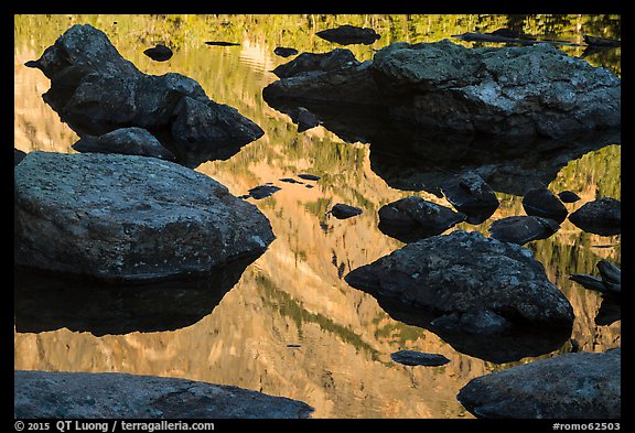 Mountain reflections and boulders, Dream Lake. Rocky Mountain National Park, Colorado, USA.