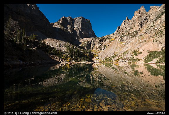 Granite walls climb straight out of Emerald Lake. Rocky Mountain National Park (color)