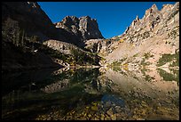 Granite walls climb straight out of Emerald Lake. Rocky Mountain National Park ( color)