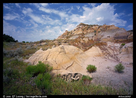Colorful badlands and clouds, North Unit. Theodore Roosevelt National Park, North Dakota, USA.