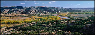 Wide valley with river and aspens in autumn color. Theodore Roosevelt National Park (Panoramic color)