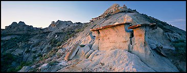 Badlands scenery with caprocks. Theodore Roosevelt National Park (Panoramic color)