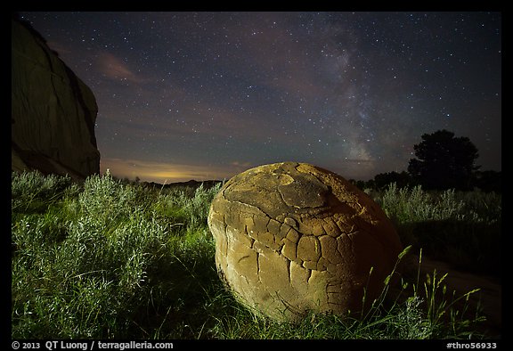 Cannonball, grasses and Milky Way. Theodore Roosevelt National Park, North Dakota, USA.