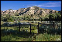 Fence around ranch house site, Elkhorn Ranch Unit. Theodore Roosevelt National Park, North Dakota, USA. (color)