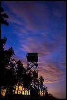 Rankin Ridge tower at dusk and starry sky. Wind Cave National Park ( color)