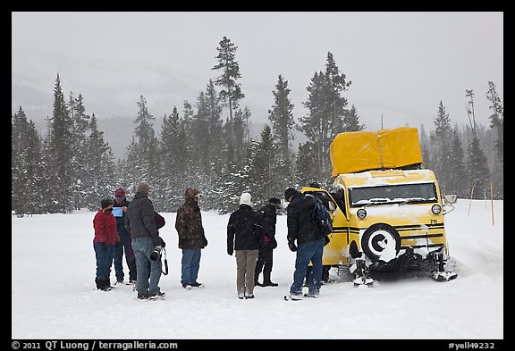 Travelers boarding snow bus. Yellowstone National Park, Wyoming, USA.