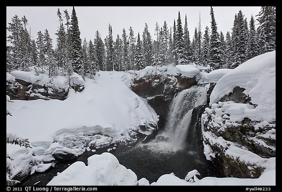 Snowy landscape with waterfall. Yellowstone National Park (color)