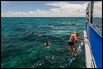 Snorkeling boat, snorklers and reef. Biscayne National Park, Florida, USA. (color)