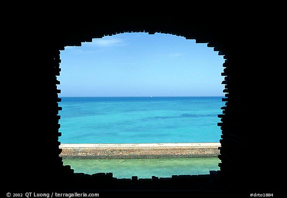 Turquoise waters framed by a cannon embrasure in Fort Jefferson. Dry Tortugas National Park, Florida, USA.