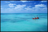 Sea kayakers in turquoise waters. Dry Tortugas National Park, Florida, USA.