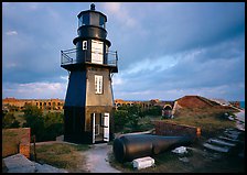Lighthouse and cannon on upper level of Fort Jefferson. Dry Tortugas National Park, Florida, USA.