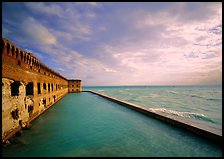 Fort Jefferson wall, moat and seawall, brighter late afternoon light. Dry Tortugas National Park, Florida, USA. (color)