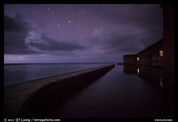 Fort Jefferson at night with stars and light from storm. Dry Tortugas National Park (color)