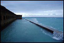 Seawall and moat with waves on stormy day. Dry Tortugas National Park, Florida, USA. (color)