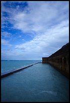 Sky, seawall and moat on windy day. Dry Tortugas National Park, Florida, USA.