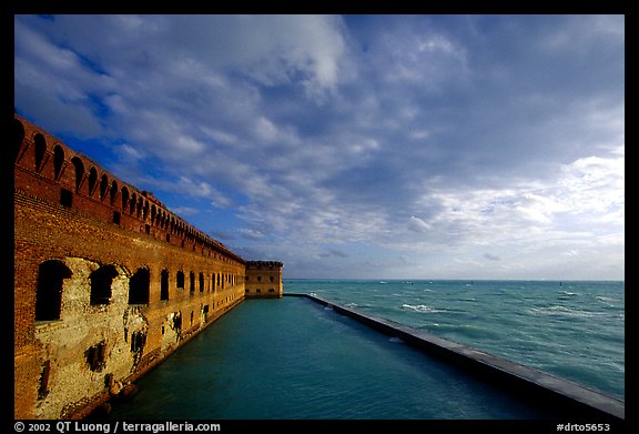 Fort Jefferson seawall and moat, late afternoon. Dry Tortugas National Park (color)