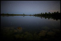 Stars and reflections in Pines Glades Lake. Everglades National Park, Florida, USA.