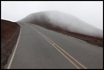 Summit road in fog, Haleakala crater. Haleakala National Park, Hawaii, USA. (color)