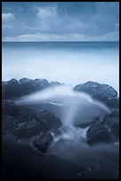 Surf, rocks, ocean and clouds, long exposure. Haleakala National Park, Hawaii, USA. (color)