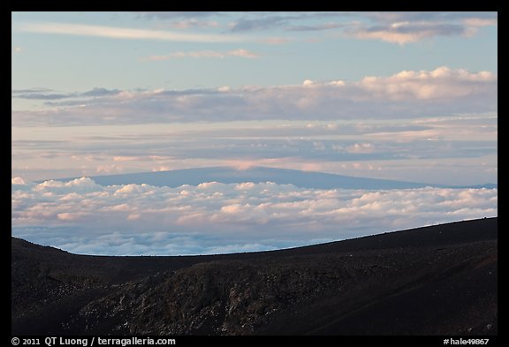 Mauna Loa framed by Haleakala Crater at sunrise. Haleakala National Park, Hawaii, USA.