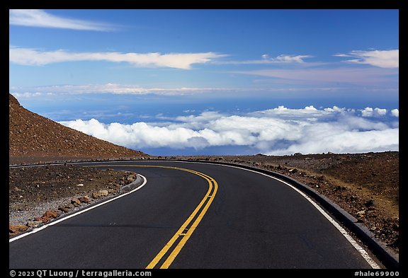 Road above clouds near Puuulaula Summit. Haleakala National Park, Hawaii, USA.