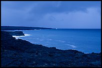 Coast covered with hardened lava and approaching storm. Hawaii Volcanoes National Park, Hawaii, USA.