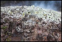 Mound of rocks covered with sulphur from vent. Hawaii Volcanoes National Park, Hawaii, USA. (color)