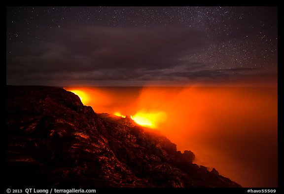 Lava makes contact with ocean on a stary night. Hawaii Volcanoes National Park (color)