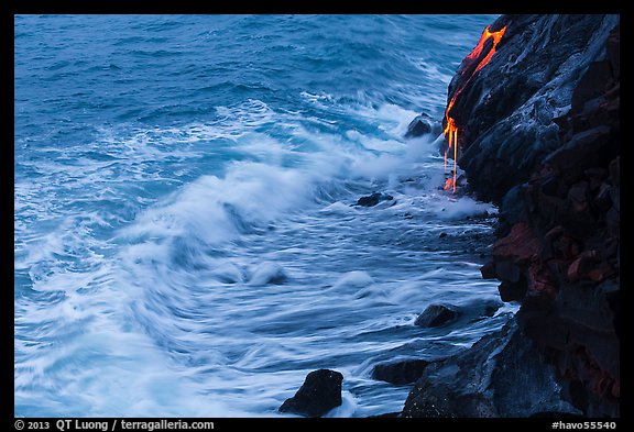 Waves and hot lava dripping from lava bench. Hawaii Volcanoes National Park (color)