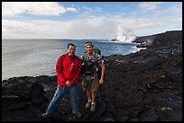 QT Luong and Bryan Lowry at near ocean entry. Hawaii Volcanoes National Park, Hawaii, USA. (color)