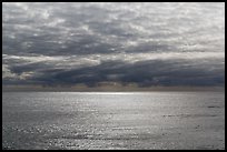 Silvery ocean and clouds, early morning. Hawaii Volcanoes National Park ( color)