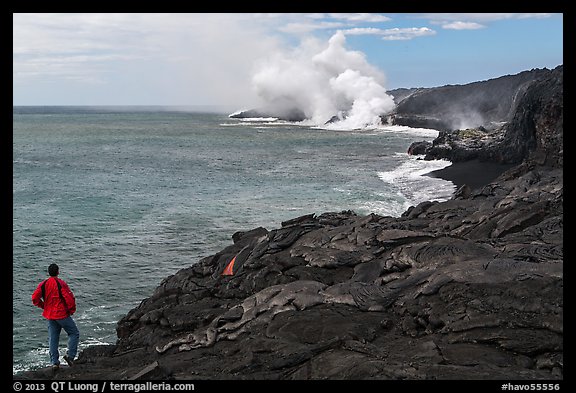 Park visitor looking, lava ocean entry plume. Hawaii Volcanoes National Park (color)