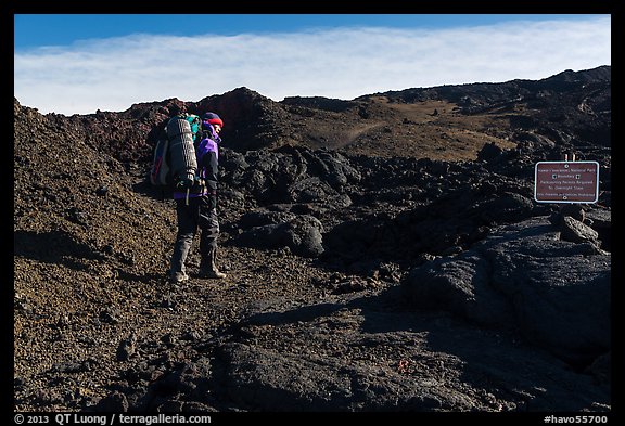 Backpacker entering park through Observatory Trail. Hawaii Volcanoes National Park (color)