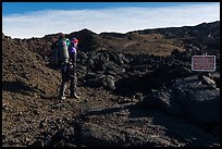 Backpacker entering park through Observatory Trail. Hawaii Volcanoes National Park ( color)