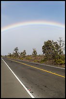 Rainbow above highway. Hawaii Volcanoes National Park ( color)