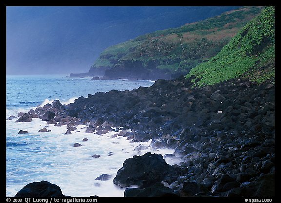 Coastline with Balsalt boulders on the wild South coast of Tau Island. National Park of American Samoa