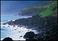 Coastline with Balsalt boulders on the wild South coast of Tau Island. National Park of American Samoa ( color)