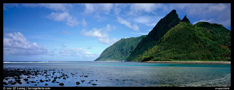 Pointed tropical peaks rising above turquoise waters, Ofu Island. National Park of American Samoa