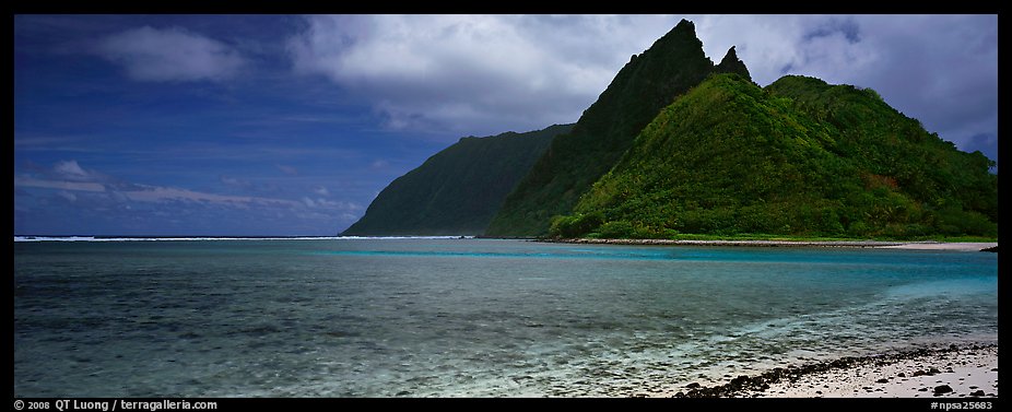 Tropical landscape with blue waters, pointed peaks, and clouds, Ofu Island. National Park of American Samoa (color)