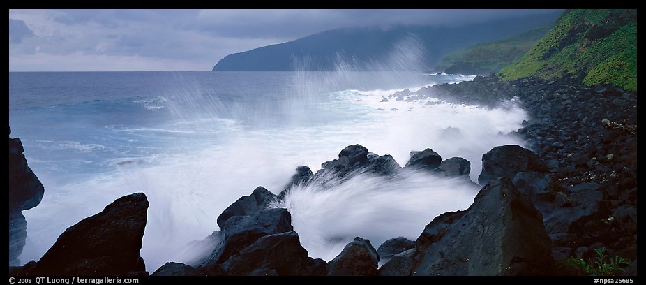 Shoreline with black rock pounded by strong surf, Tau Island. National Park of American Samoa (color)