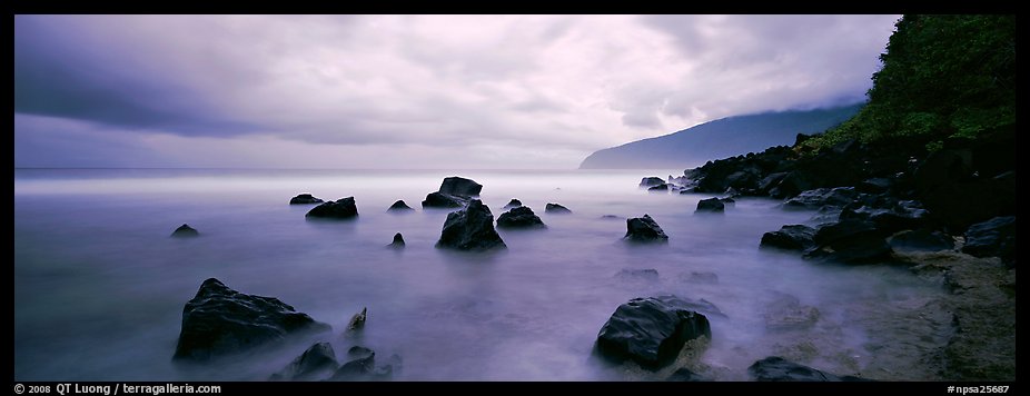 Coast with boulders and storm clouds, Tau Island. National Park of American Samoa (color)