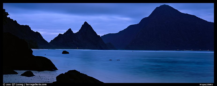 Bay with coastal peaks at dusk. National Park of American Samoa